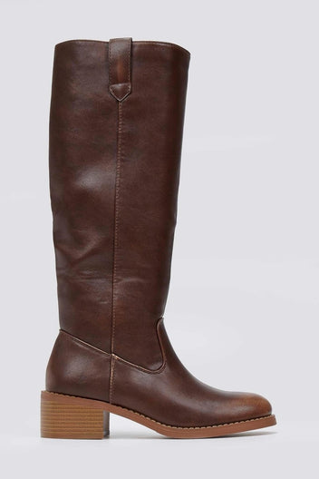 Dark brown leather knee-high boot with round toe and tan block heel, side view on a light grey background