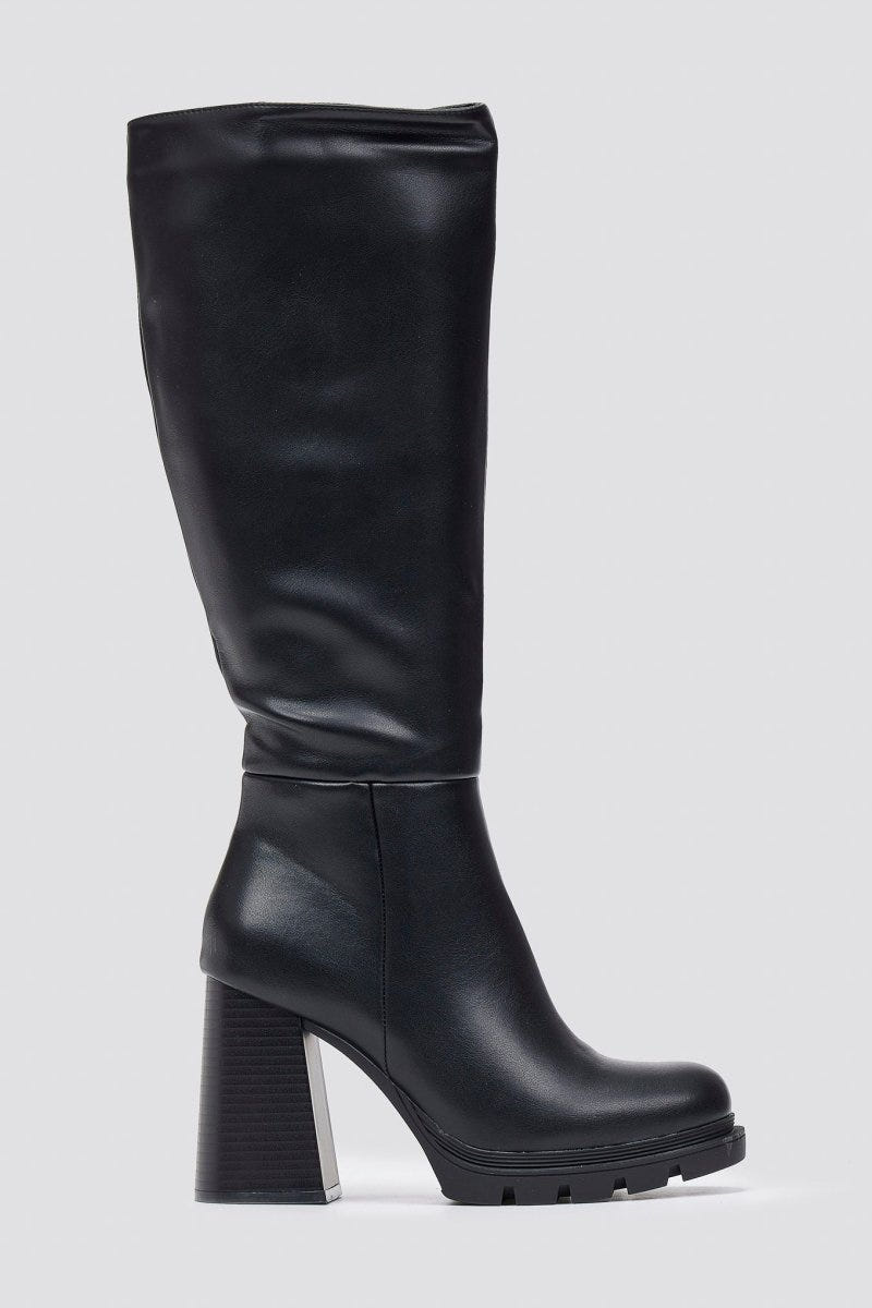 Black leather knee-high boot with block heel and smooth shaft, side view on a light grey background