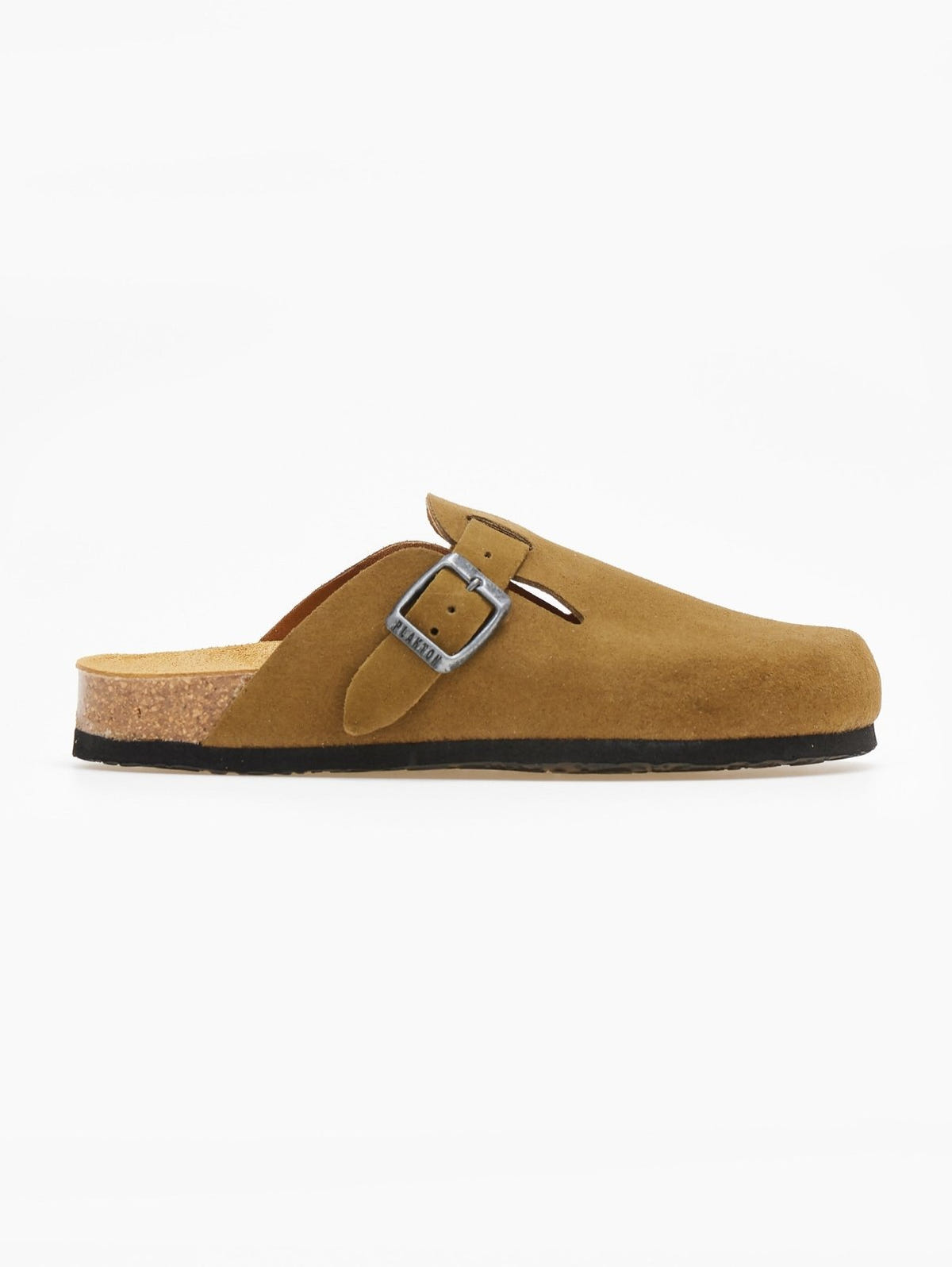 Side view of single olive suede clog with buckle strap and tan cork footbed on a plain white surface