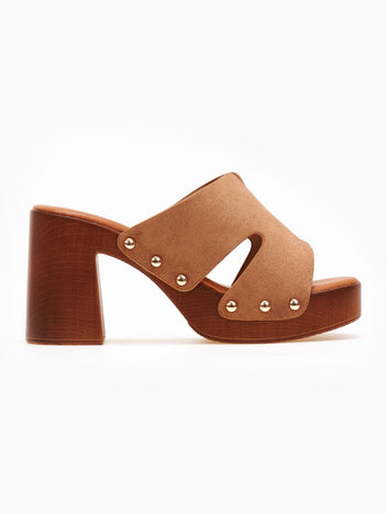 Tan suede block heel slide with cut-out straps, gold studs and wooden-look platform, side view on a white background