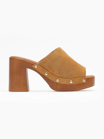 Olive suede block heel slide with wooden-look platform and gold studs, side view on a white background