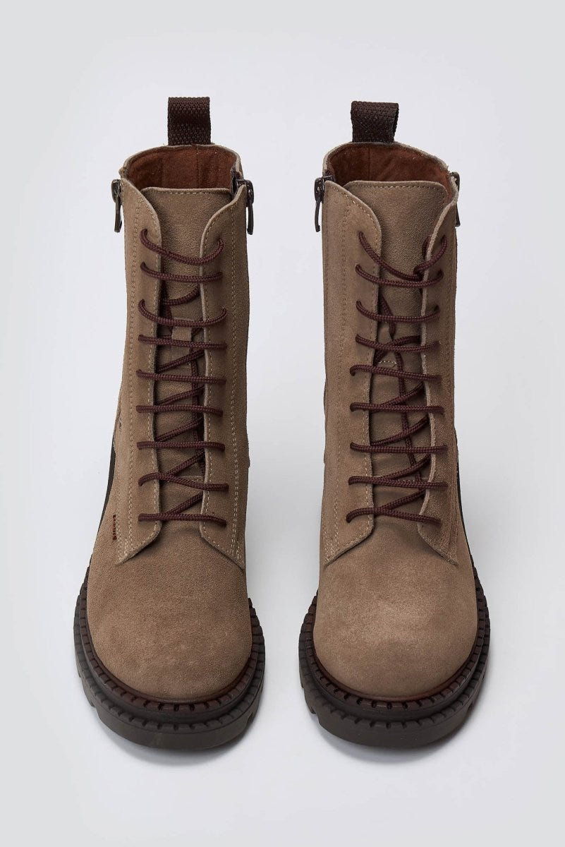 Pair of taupe suede lace up boots with block heel, laid flat from above on light grey background