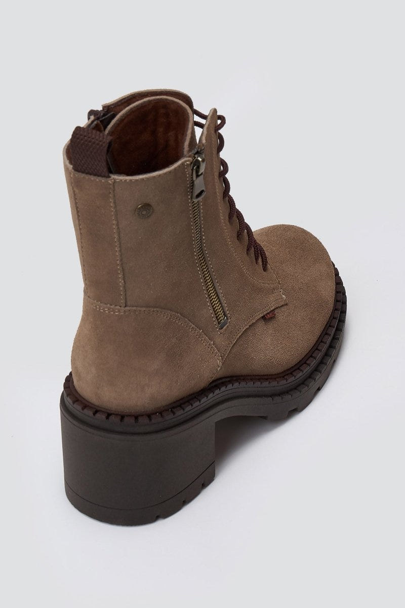 Taupe suede lace up boot with side zip and block heel, angled top view on light grey background
