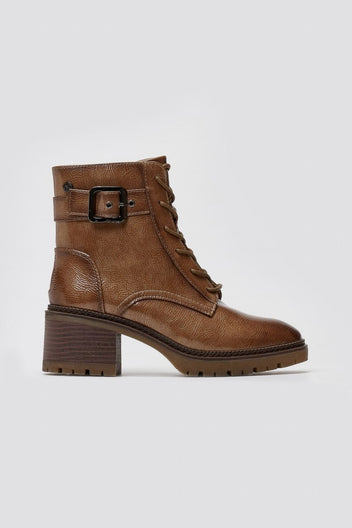 Brown leather lace-up ankle boot with buckle strap, block heel and lug sole, side view on a light grey background