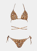 Leopard print triangle bikini top with halter tie and matching side-tie bikini bottom, laid flat on white background