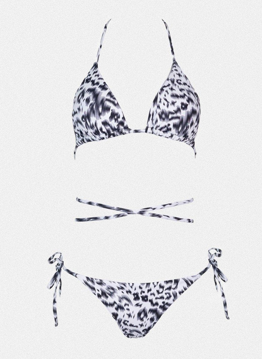 Navy and white leopard print triangle bikini top with halter tie and matching side-tie bikini bottom, laid flat on white