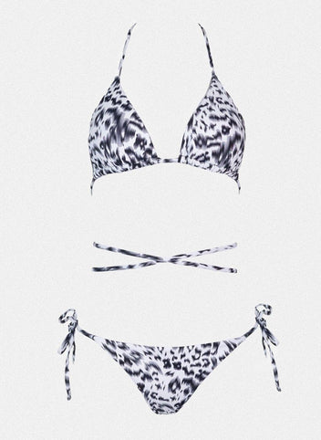 Navy and white leopard print triangle bikini top with halter tie and matching side-tie bikini bottom, laid flat on white