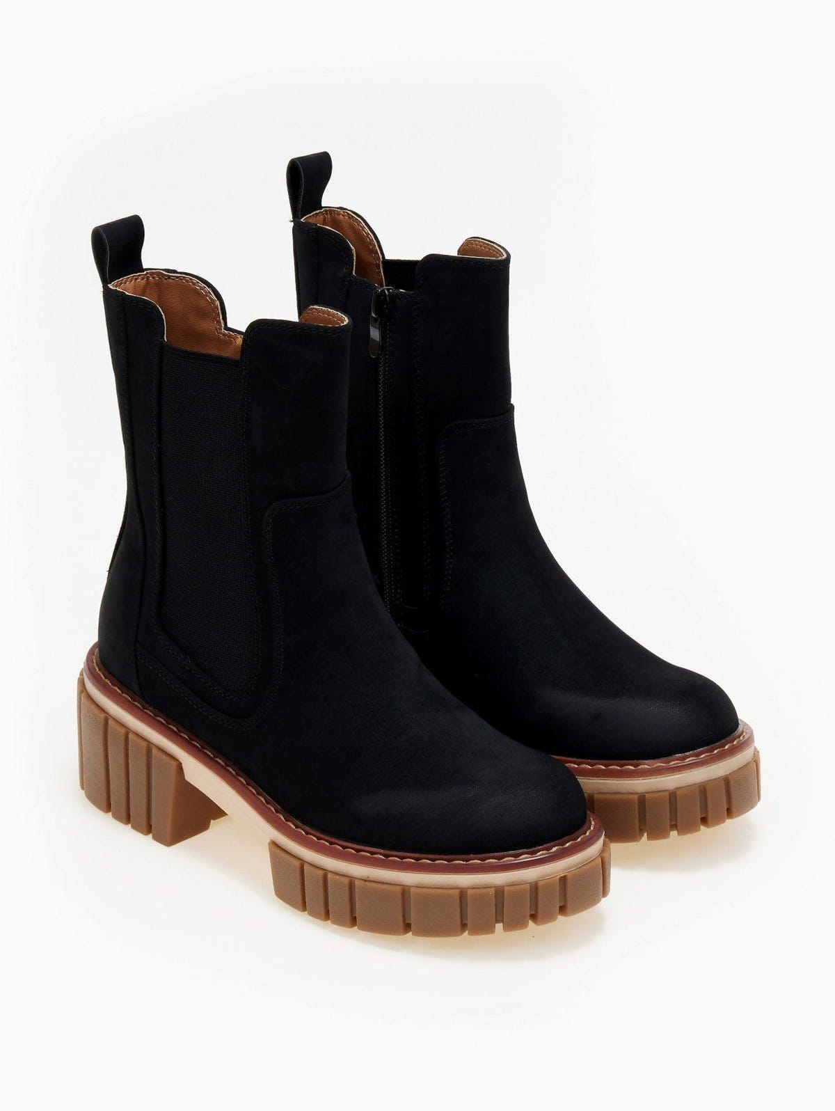 Pair of black suede Chelsea boots with side zip, elastic gusset and ridged tan sole, three-quarter view