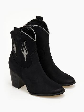 Pair of black suede cowboy ankle boots with silver flames, pointed toe and block heel, front view