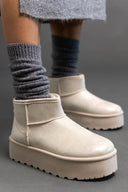 Μποτάκια κοντά με γούνα και ψηλή σόλα ERYNN