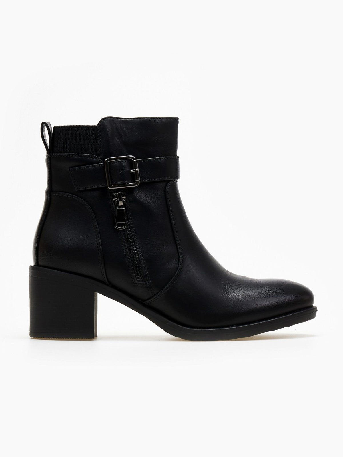Block heel ankle boots with buckle strap and decorative outer zipper in black faux leather, side view