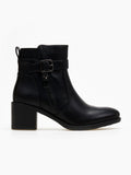 Block heel ankle boots with buckle strap and decorative outer zipper in black faux leather, side view