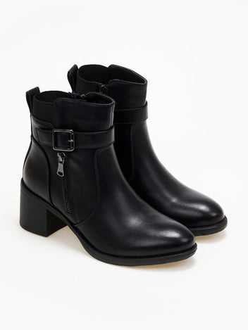 Block heel ankle boots with buckle strap and side zip in black faux leather, three-quarter view of the pair