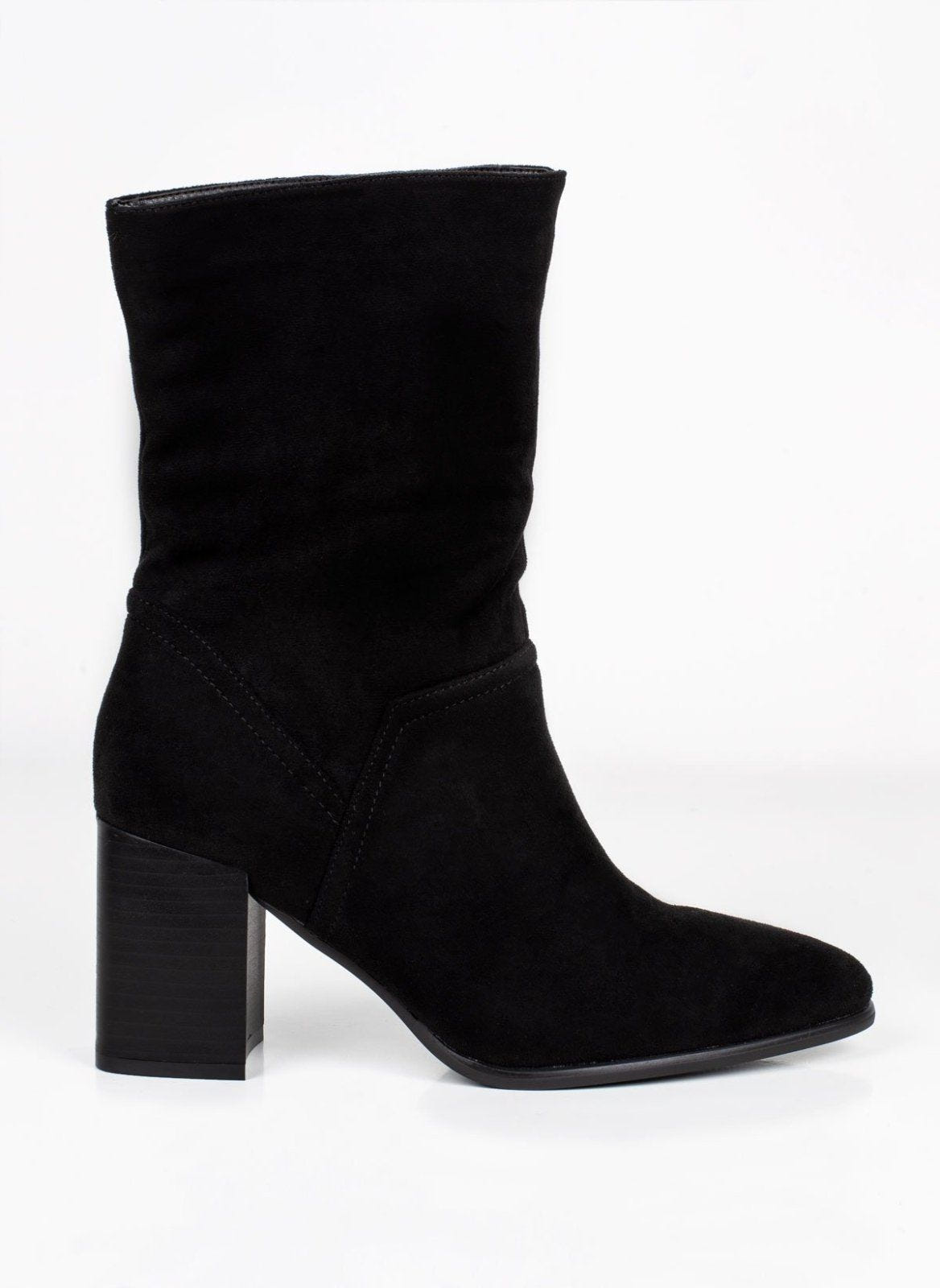 Black suede block heel ankle boot, side view showing slouchy shaft, pointed toe and wooden-look heel