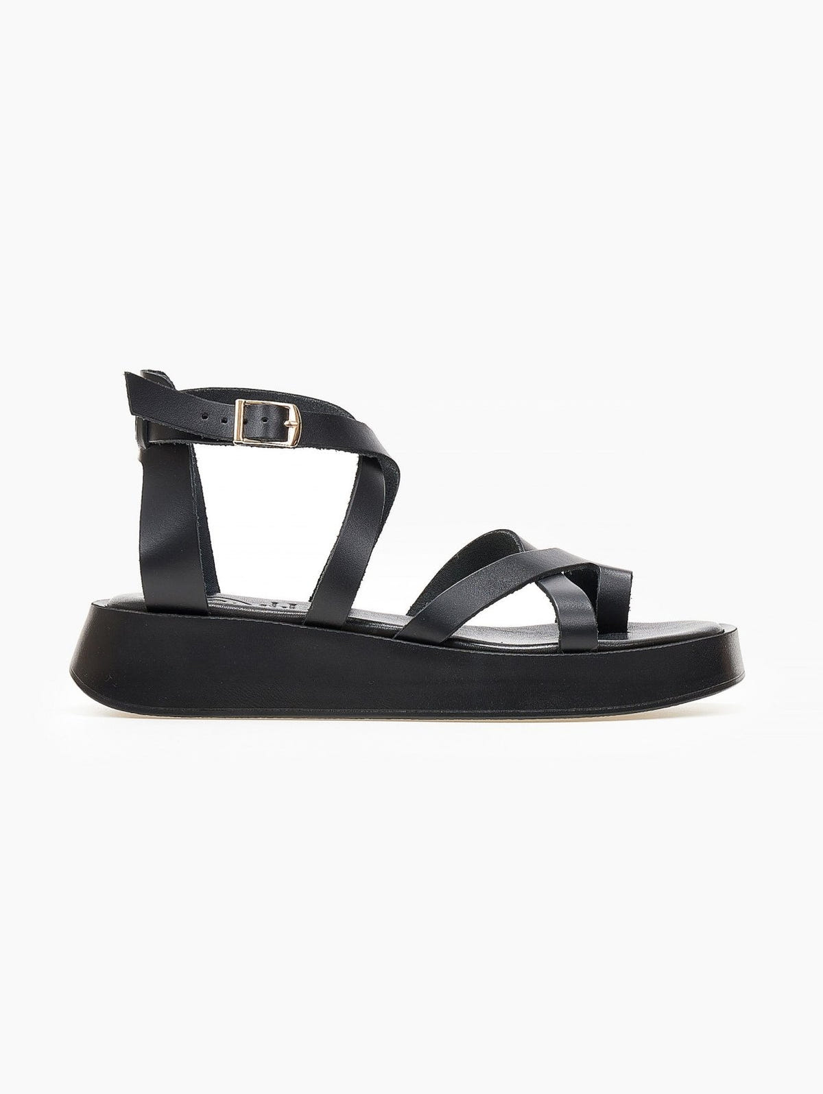 Black leather crossover strap platform sandal with toe loop and ankle buckle, side view