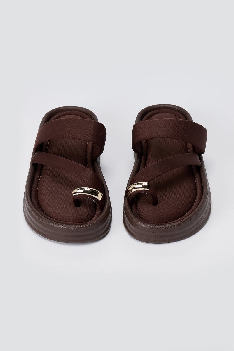 Pair of brown flatform toe ring sandals seen from above, with two straps across the foot and a metal ring at the toe
