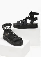 Σανδάλια flatforms δερμάτινα με δέσιμο estil