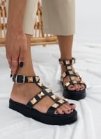 Σανδάλια flatforms δερμάτινα με τρουκς estil