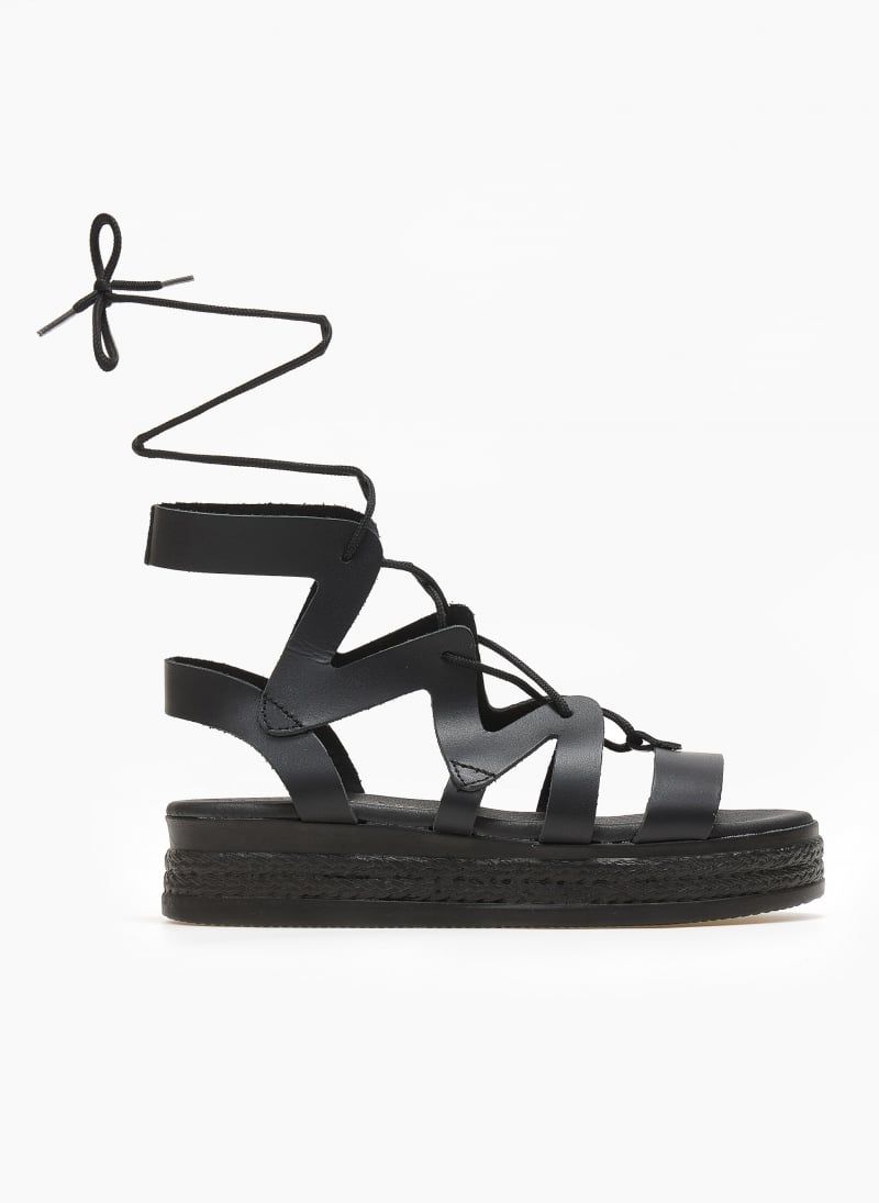 Σανδάλια flatforms δερμάτινα με δέσιμο estil