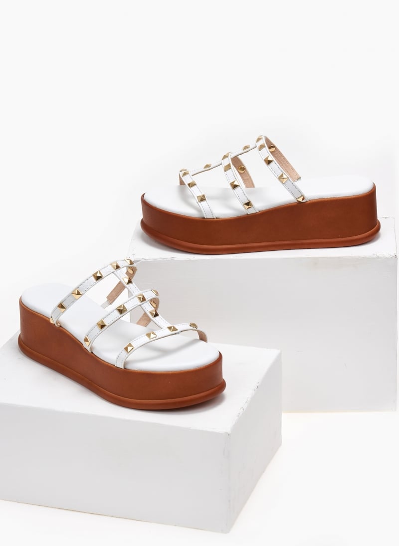 Flatforms δερμάτινα με τρουκς estil