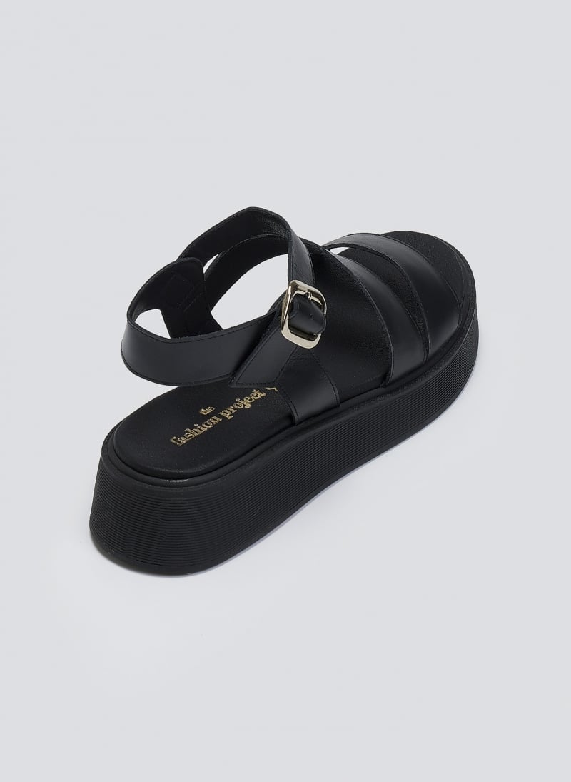 Σανδάλια δερμάτινα flatforms με φάσες Tfp