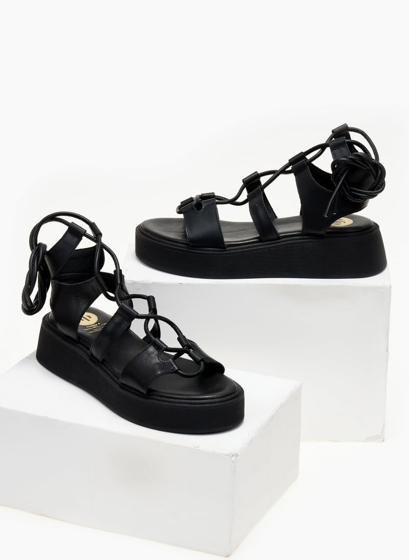 Σανδάλια flatforms δερμάτινα με κορδόνια TFP